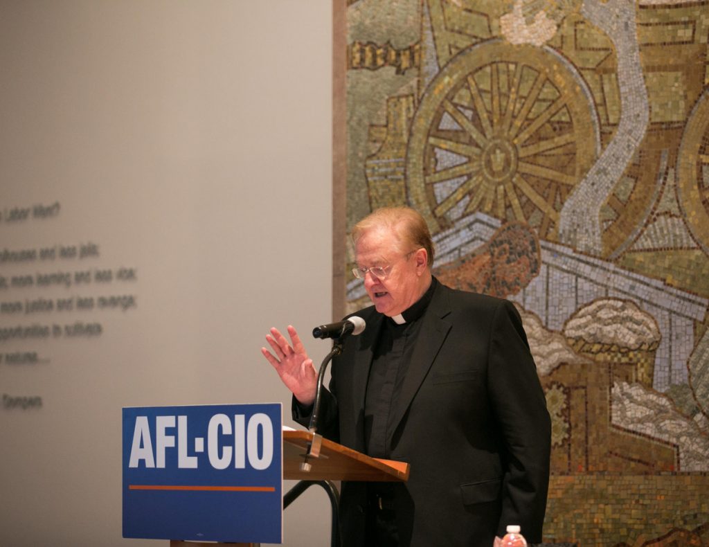 Fr. McManus speaking at AFL-CIO Headquarters